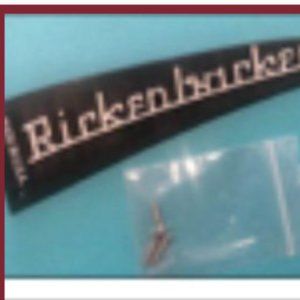 BLACK RICKENBACKER TRUSS ROD COVER WITH RAISED WHITE LETTERS